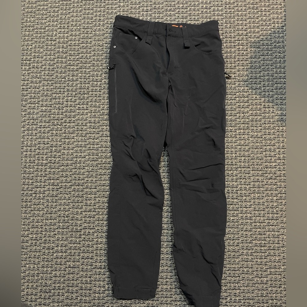 Revolution Race men’s outdoor jeans in a size medium.